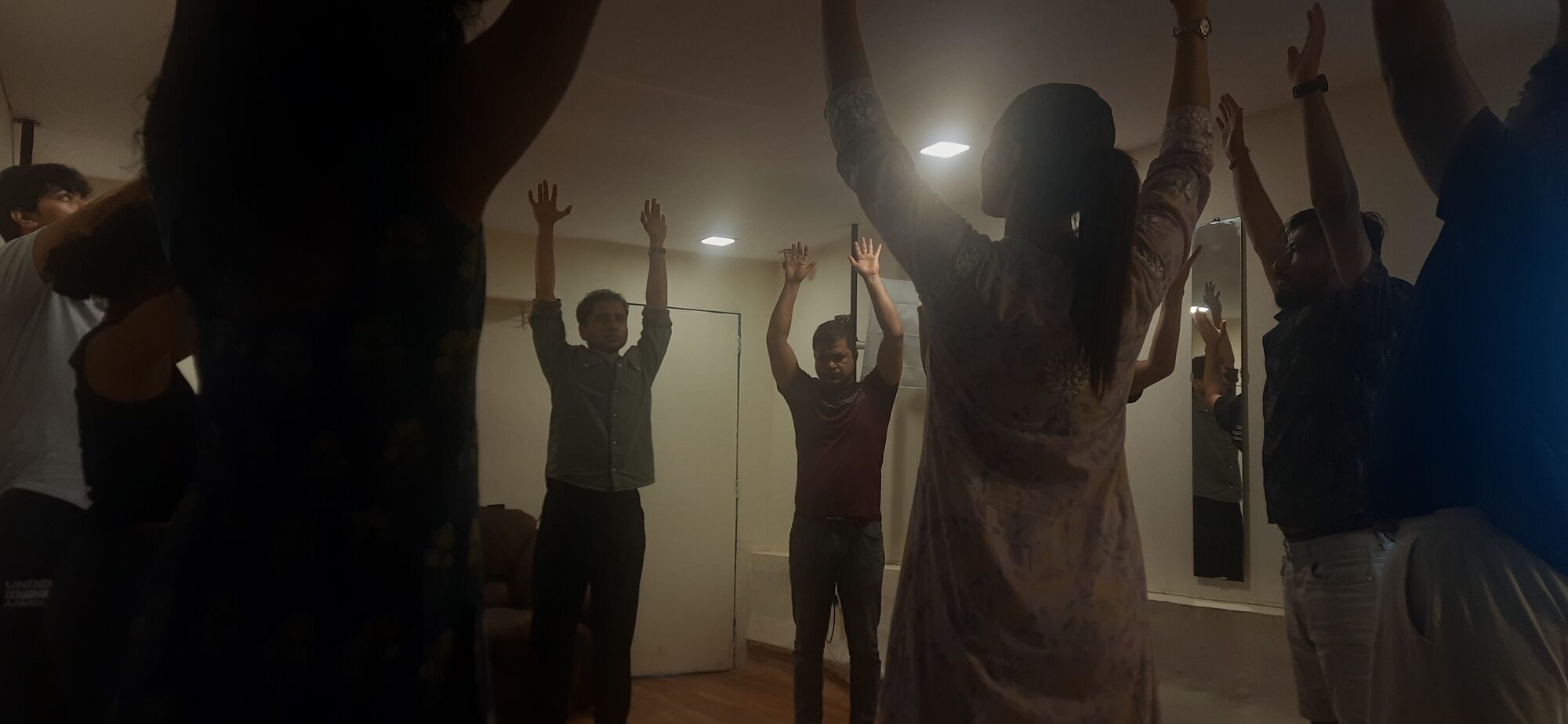 A workshop in session, participants fully present in the room
